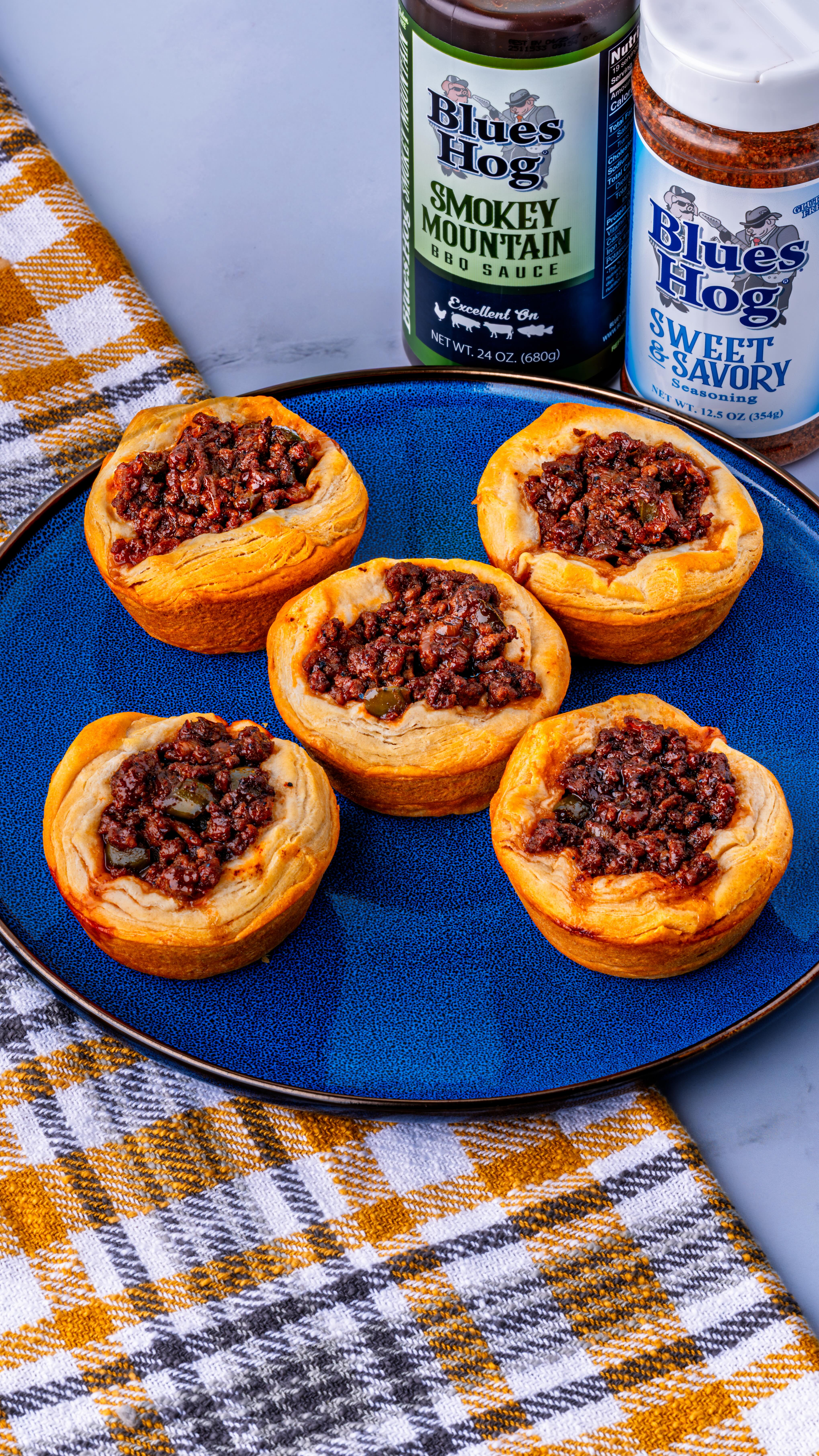 Instagram post by @dowellcooks for Blues Hog. Caption reads: Sloppy Joe Biscuit Cups! The perfect game day....