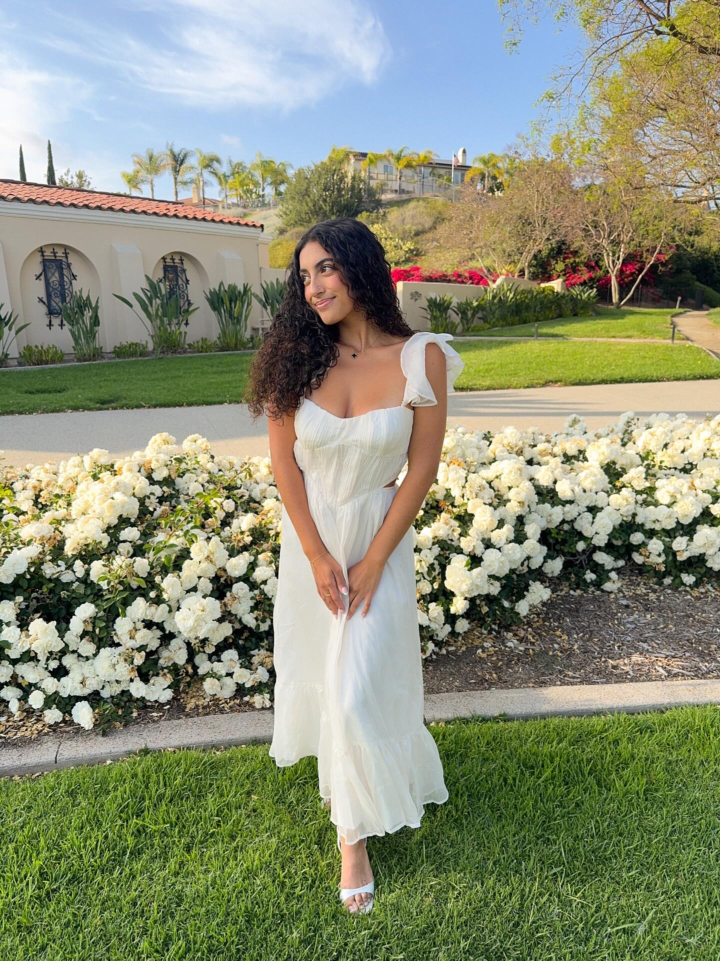 Instagram post by @angelaaguilarrr for Lulus. Caption reads: all dolled up with @lulus Use my code ‘ANGIE20’....