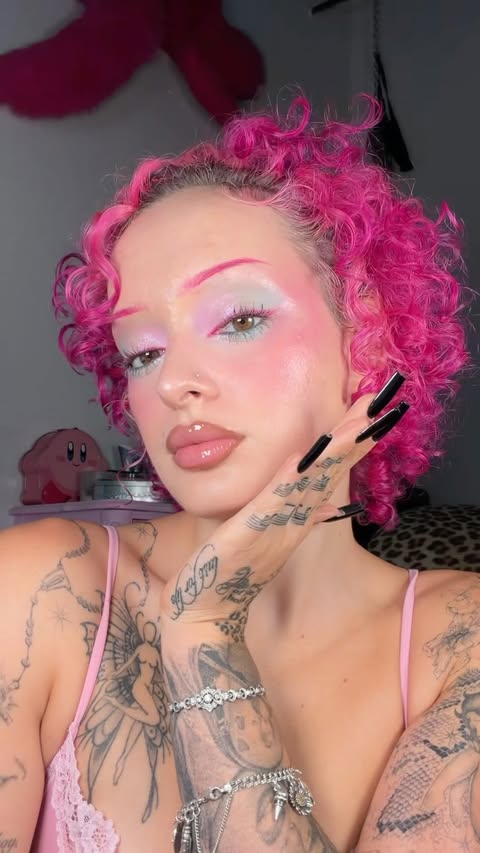 Instagram post by @fluttaflyz for Makeup Revolution. Caption reads: #ad i’ve reached my final form 🤭....