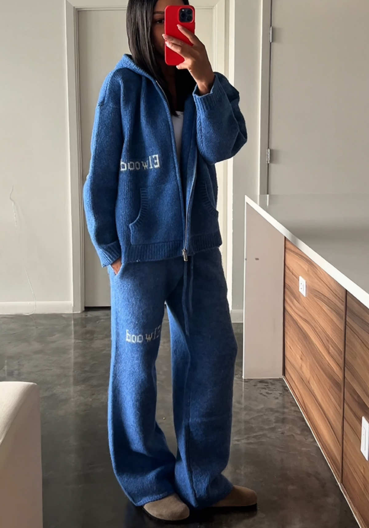 TikTok post by @kkyliemeyers for Elwood Clothing. Caption reads: best sweat sets @Elwood .