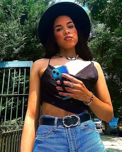Instagram post by an influencer for boohoo. Caption reads: [...] FASHION Top: @boohoo Ring: @monicavinader....