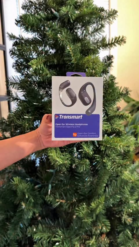 Instagram post by @america.timee for Tronsmart. Caption reads: @tronsmart OpenFly 2 Pro fits perfectly into [...].