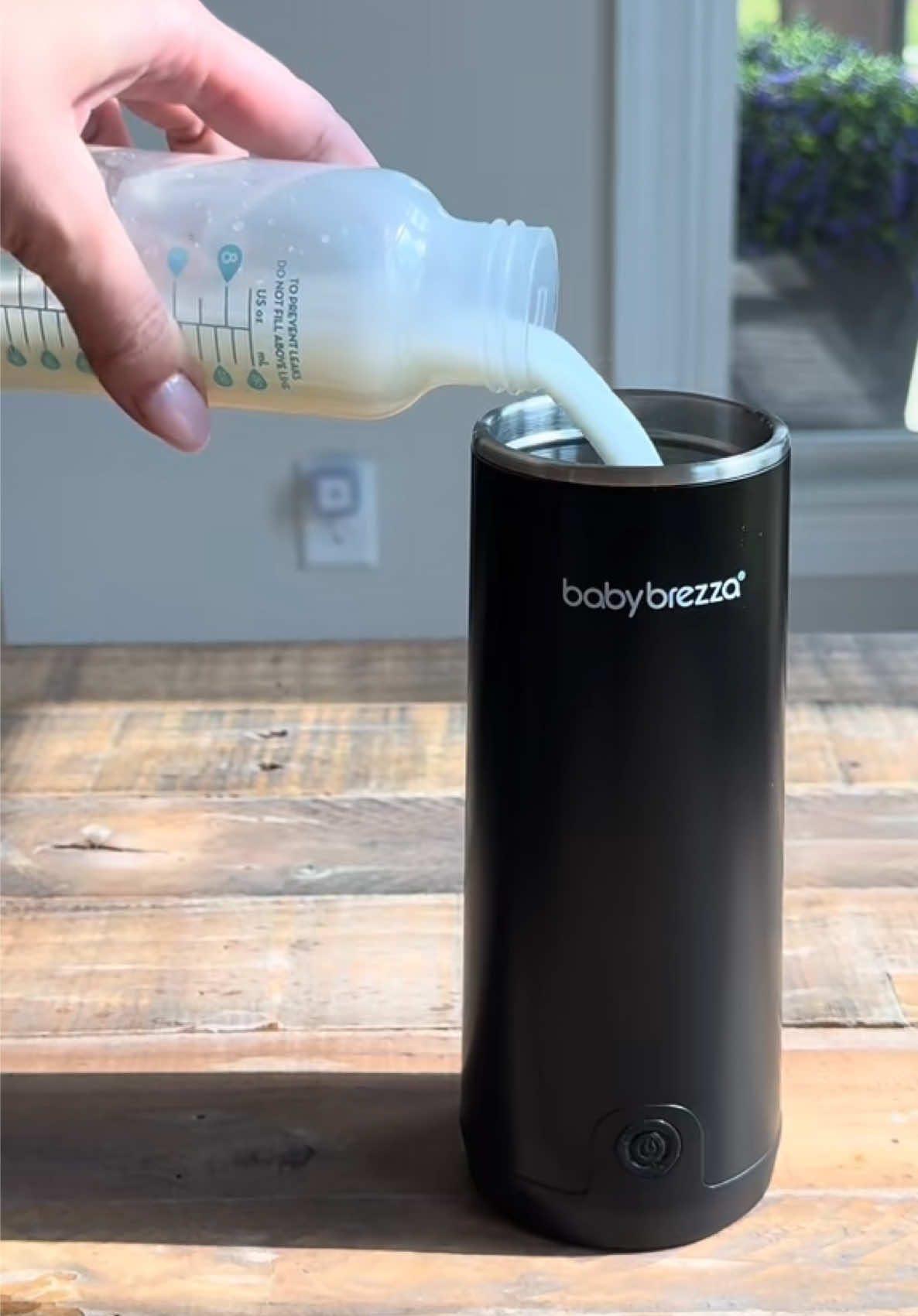 TikTok post by @ashleybechter for Baby Brezza. Caption reads: [...] #parentsmarternotharder @Baby Brezza.