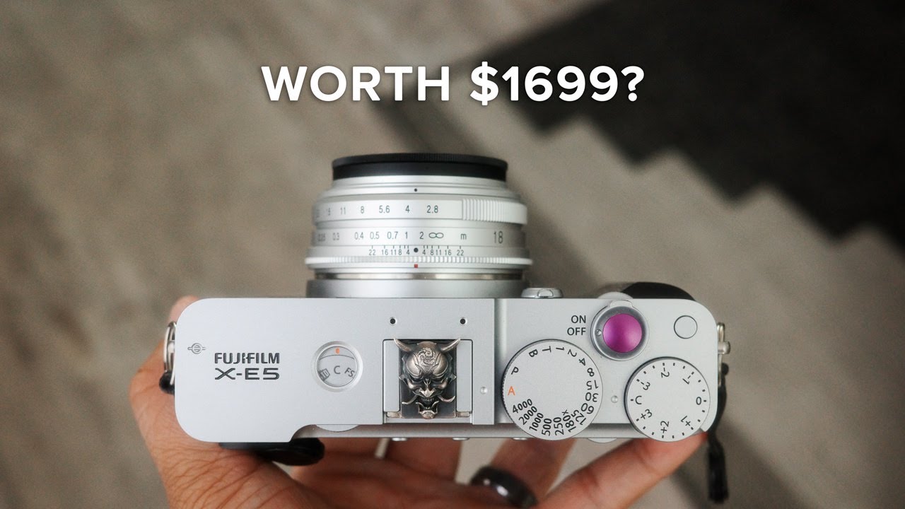 YouTube post by @Reggiebphoto for Thinkific. Caption reads: Fujifilm X-E5 First Impressions: Not What I....