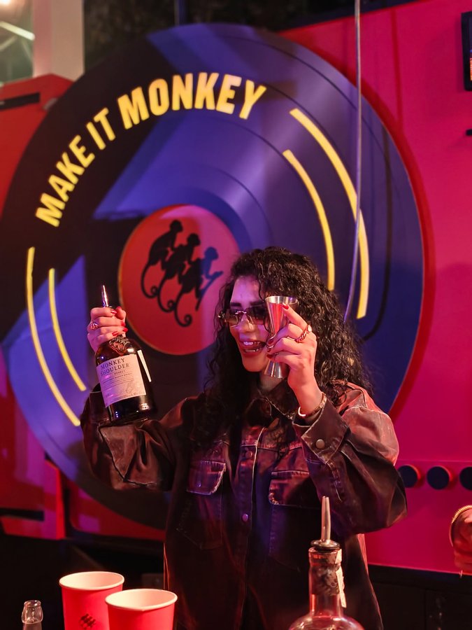 Instagram post by @mahaksharmaa_ for Monkey Shoulder. Caption reads: @monkeyshoulder in the mix🍸my monkey 🐒 my....