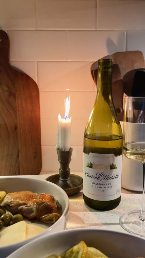 Instagram post by @meggmichellee for Chateau Ste. Michelle Winery. Caption reads: Saved you a seat for Tavern Dinner 🕯️🍇 (since....