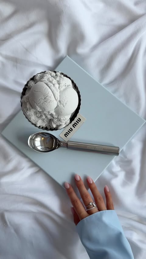 Instagram post by @cayleymia for Miu Miu. Caption reads: Serving Miu Miu Fleur de Lait 🍨🤍 The creamiest....