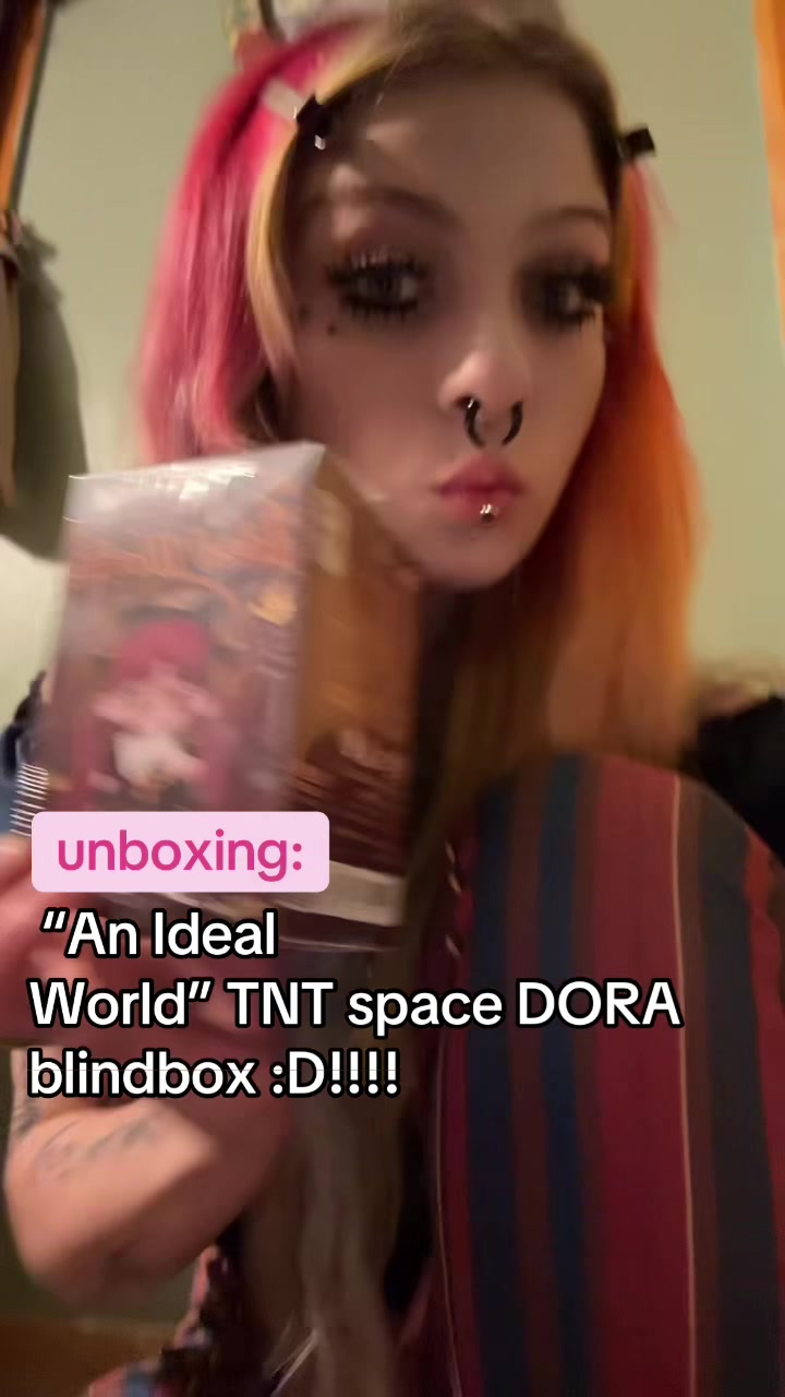 TikTok post by @doombringerirl for TNT SPACE. Caption reads: @TNT SPACE US this is the best blind box ever omg....
