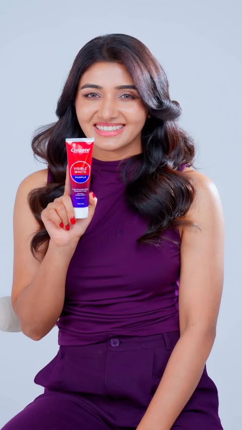 Instagram post by @mirnaaofficial for Colgate. Caption reads: [...] want purple, see it in my smile 💜😁 Colgate....