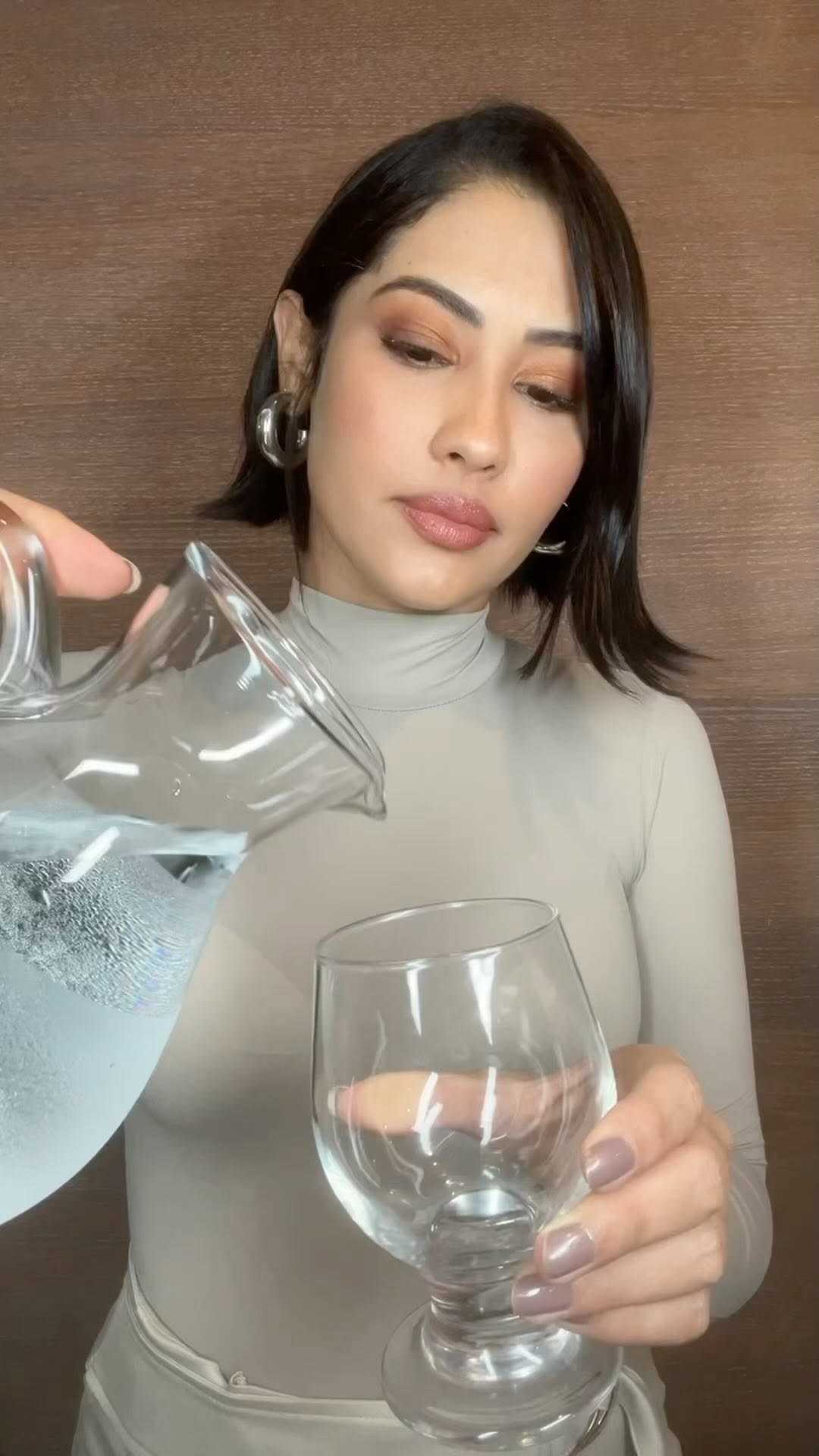 Instagram post by @thaynaraog for Tang Brasil. Caption reads: A vulnerabilidade hídrica afeta cerca de 40....