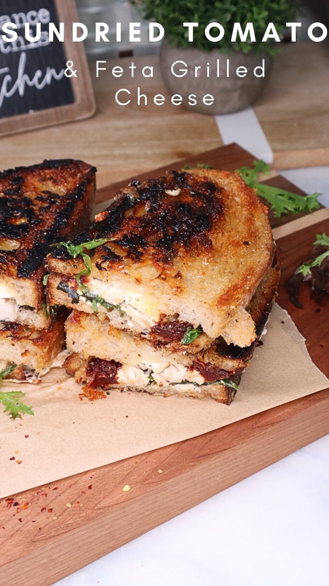 Instagram post by @cookingkatielady for TRIFECTA. Caption reads: Sun-dried Tomato & Feta Grilled Cheese....