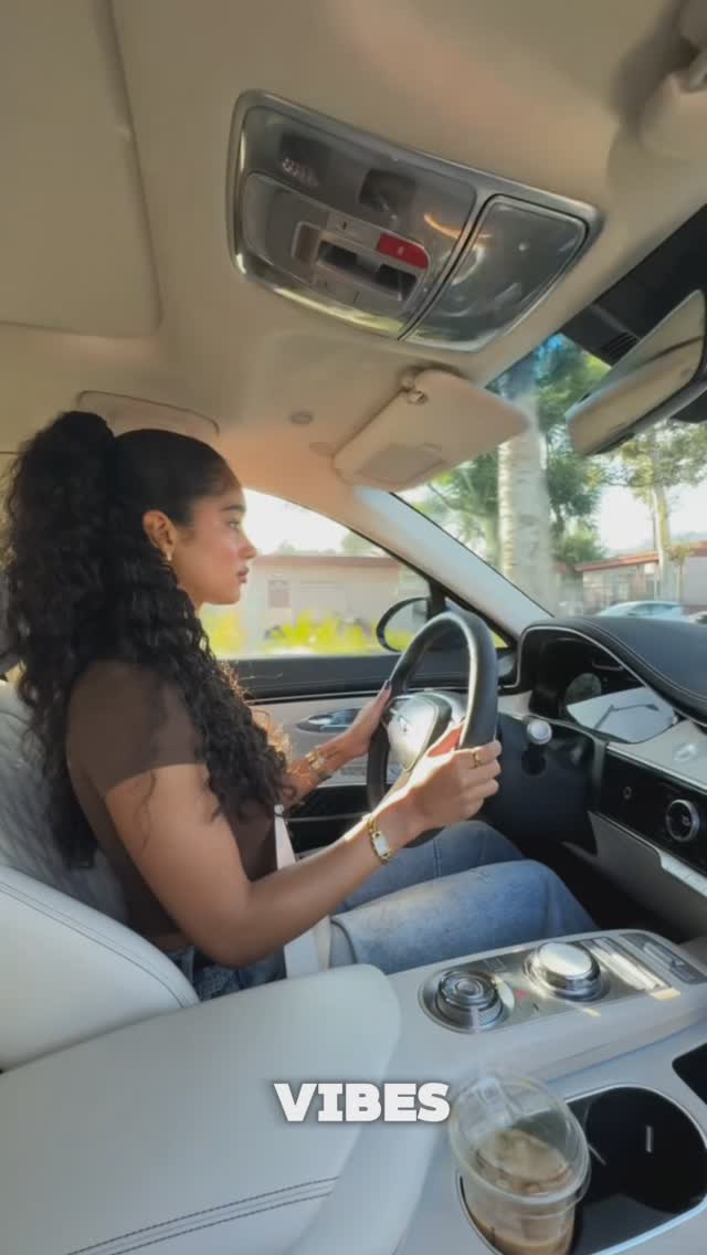 Instagram post by @lalatheislandgal for Genesis USA. Caption reads: Day (🚙 drive) in the life with @genesis_usa....