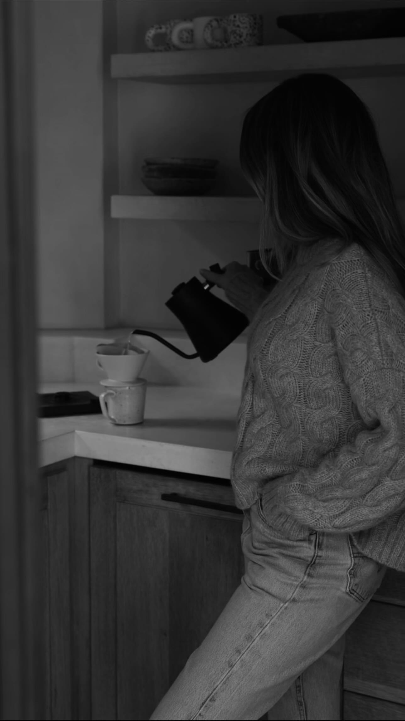 Instagram post by @caitlinconfidential for Jenni Kayne. Caption reads: Morning rituals ☕️ wearing new Jenni Kayne....