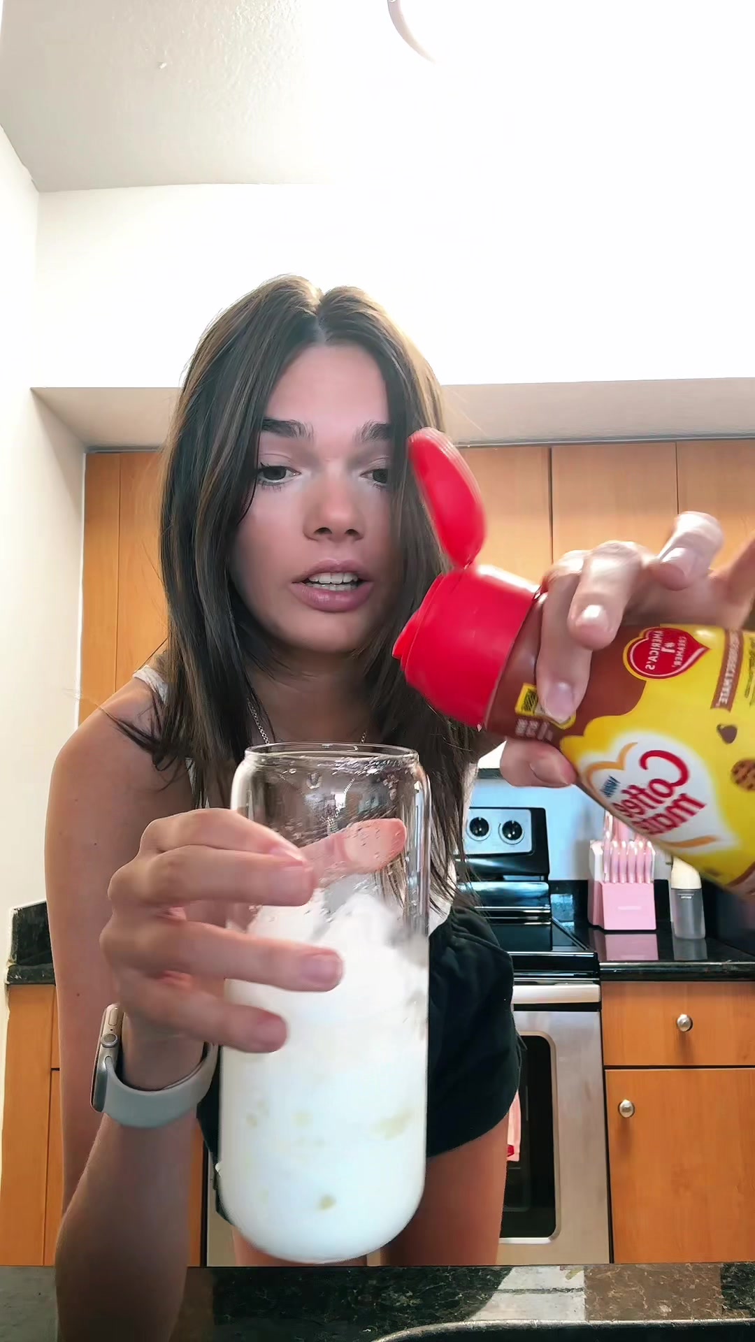 TikTok post by @olivia.eig for Coffee Mate. Caption reads: [...] #athomecoffee @NESCAFÉ @Coffee mate.