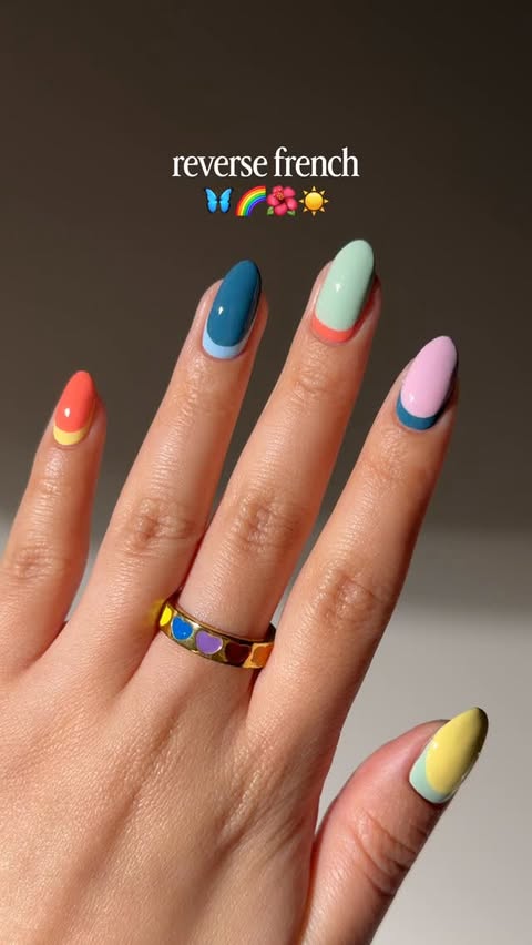 Instagram post by @bycheznails for ella+mila. Caption reads: [...] art design with lots of colors! 🌈ad....