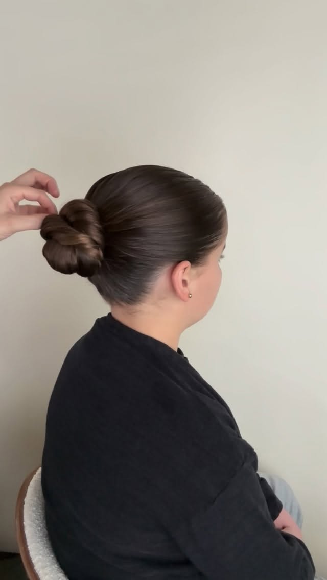 Instagram post by @updos.by.jocelyn for DESIGNME Hair. Caption reads: Save this video to try out this simple sleek updo....