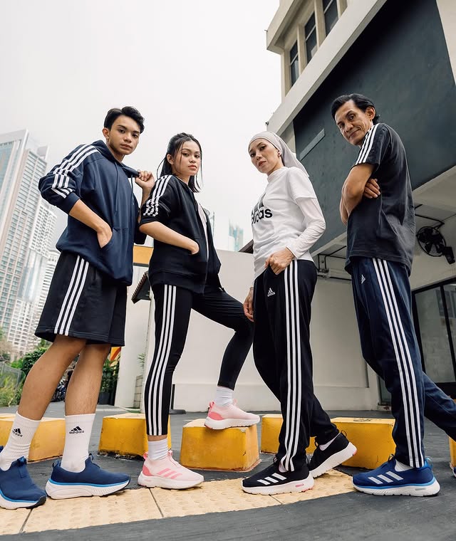 Instagram post by @fazrick.faizal for al-ikhsan SPORTS. Caption reads: adidas CLOUDFOAM COMFORT 

Embracing togetherness....