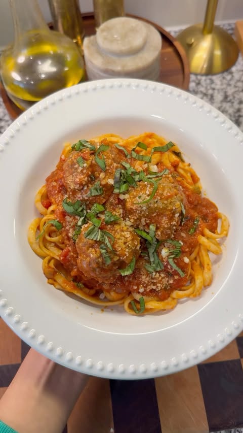 Instagram post by @livinnwithlivs for Bloom Nutrition. Caption reads: Nothing beats a nostalgic comfort meal 🪄🍝comment....