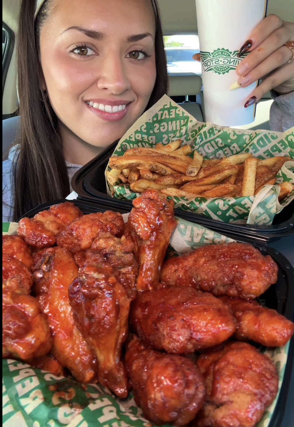 TikTok post by @cabreranali for Wingstop. Caption reads: finally trying @Wingstop’s NEW fiery lime flavor....