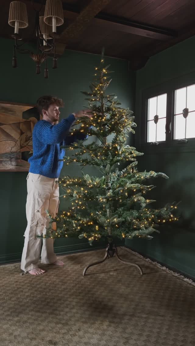 Instagram post by @lonefoxhome for West Elm. Caption reads: Decorating my home for the holidays with the help....