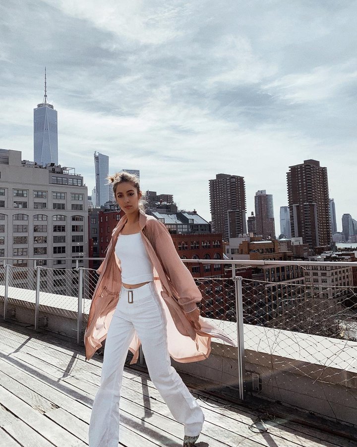 Instagram post by @rosacrespo for BCBGMAXAZRIA. Caption reads: Spring has officially Sprung 🌷 g-bye Teddy coats....