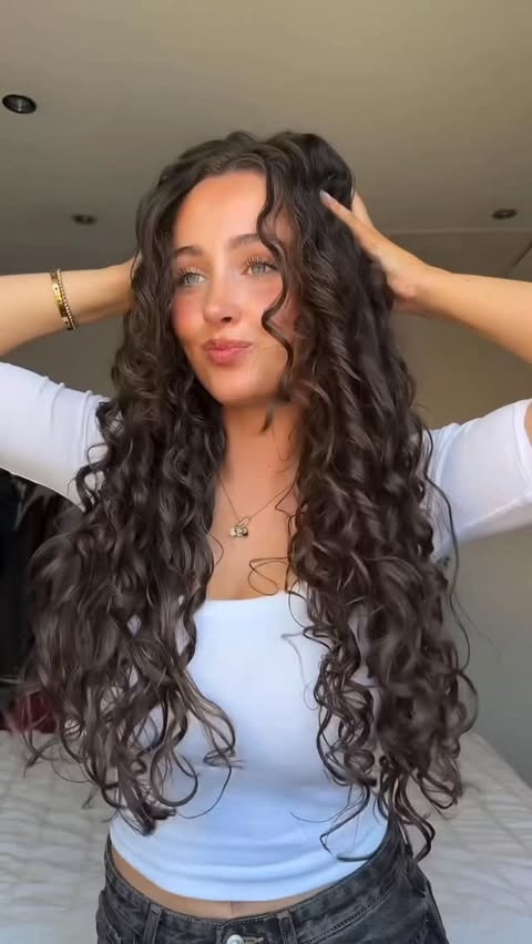 Instagram post by @loren_hodgson for Cocoandeve. Caption reads: [...] curls — my new fav curl detox duo ✨....