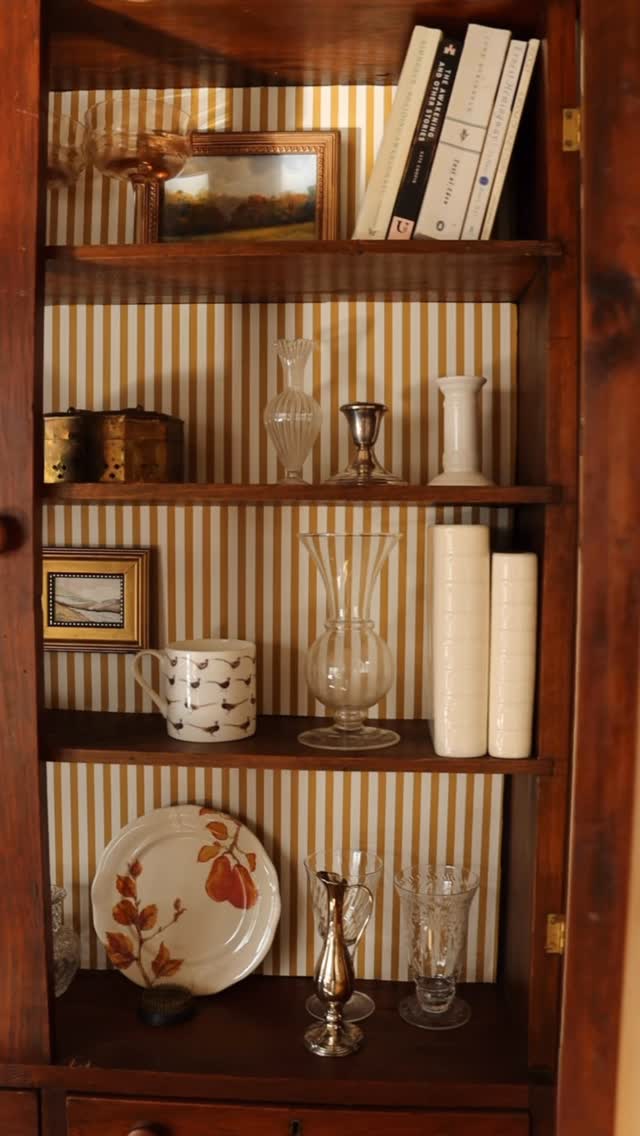 Instagram post by @thesunalsoreads for Sandberg Wallpaper. Caption reads: Just when I thought I couldn’t love this hutch any....