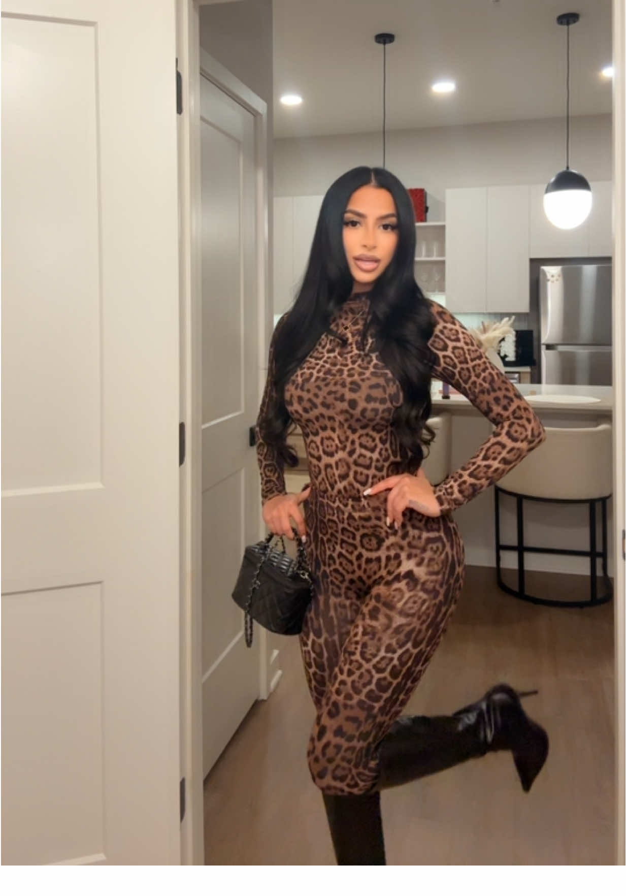 TikTok post by @seniaax3 for Naked Wardrobe. Caption reads: saturday night out in @Naked Wardrobe 🖤....