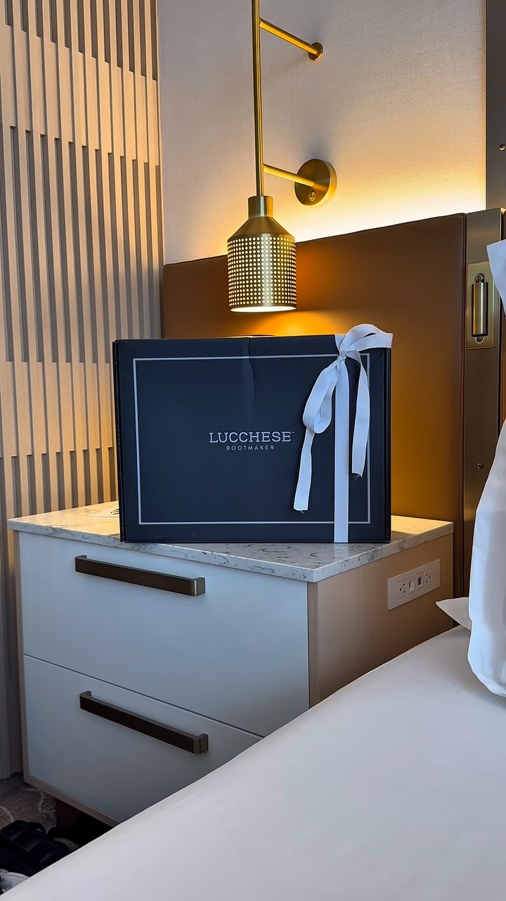 Instagram post by @ashlyncarmela for Lucchese. Caption reads: [...] dad with a fresh pair of some new @lucchese....