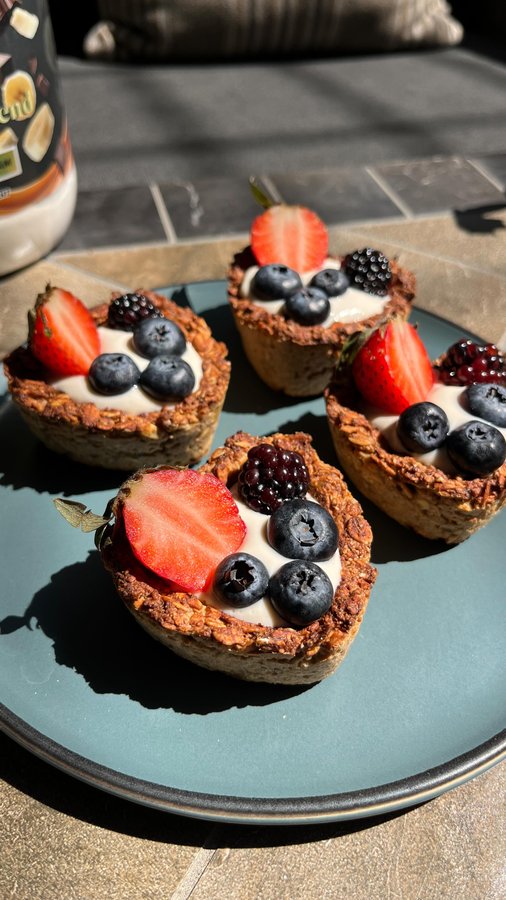 Instagram post by @regs_healthy_eats for Protein World. Caption reads: Love at first bite! 😍💪 These high-protein....