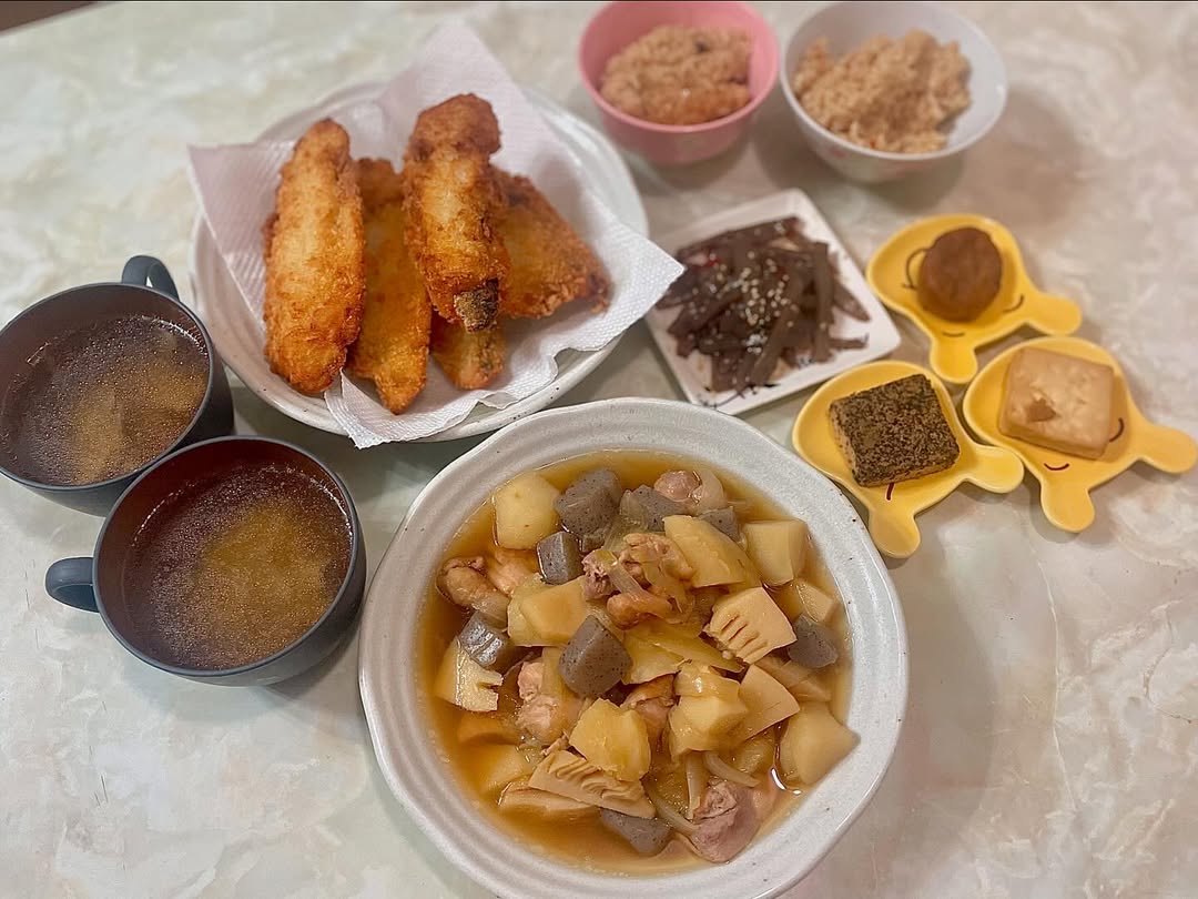 Instagram post by @tabelog_sake for Toyama Station City. Caption reads: 🏠
・
・
・
#おうちごはん

✔️筑前煮
✔️鯖フライ
✔️こんにゃくの甘辛炒め
✔️あん肝の....