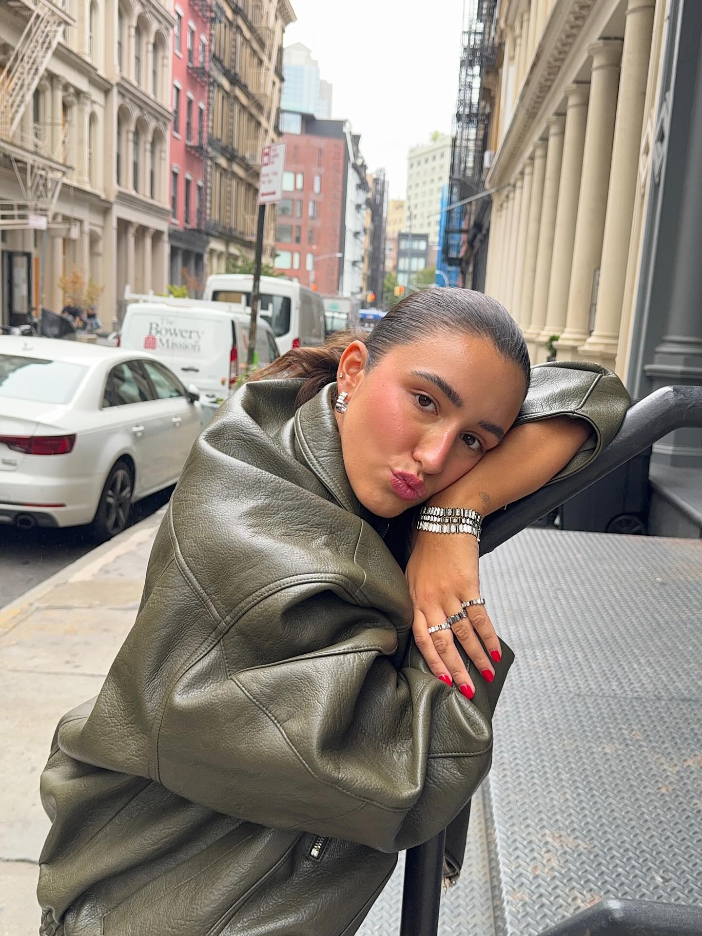 Instagram post by @mayadorable for APM Monaco. Caption reads: Ready for fall 🗽🍁@apmmonaco 💚.