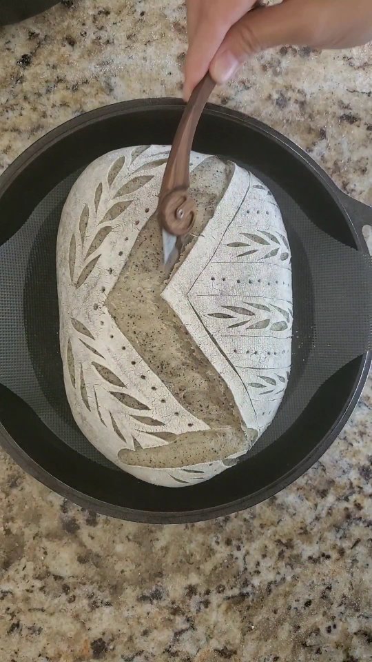 Instagram post by @ohfortheloaf for The Kitchn. Caption reads: LOAF 138 [BLACK SESAME SOURDOUGH] 

Oooopsies! I....