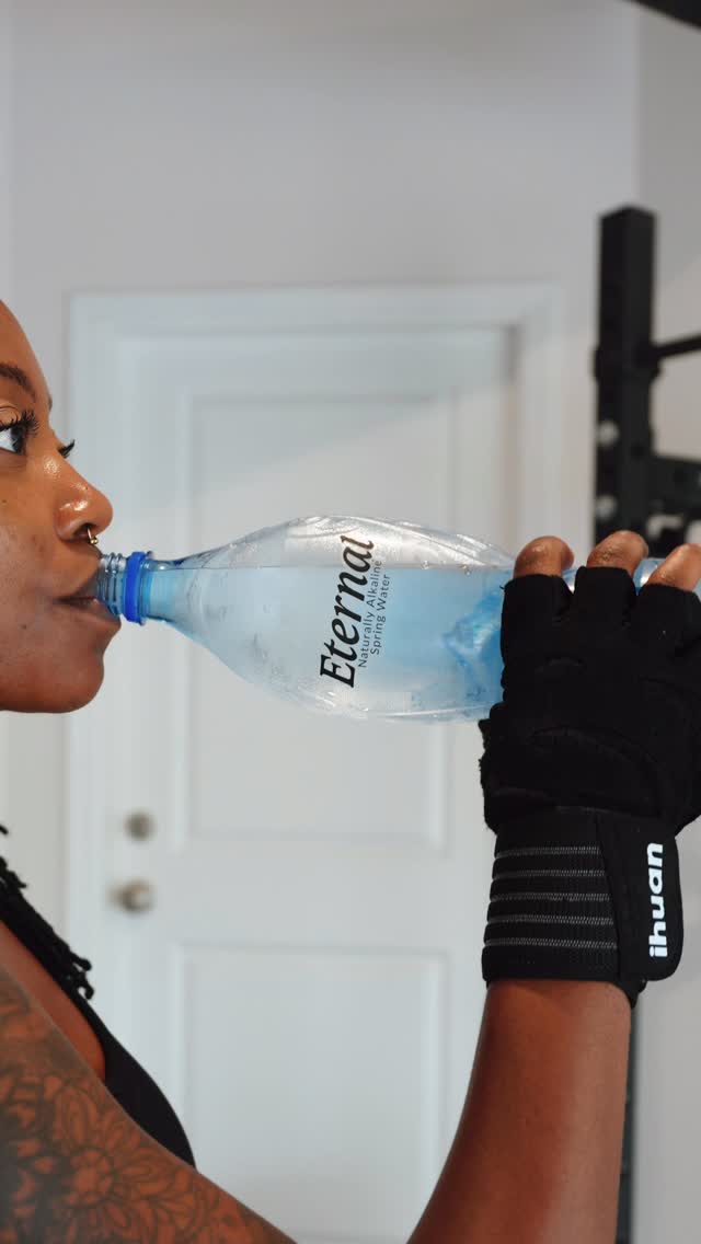 Instagram post by @keke.j_ for Eternal Water. Caption reads: Glutes, hams, & hydration 💦 Staying refreshed....