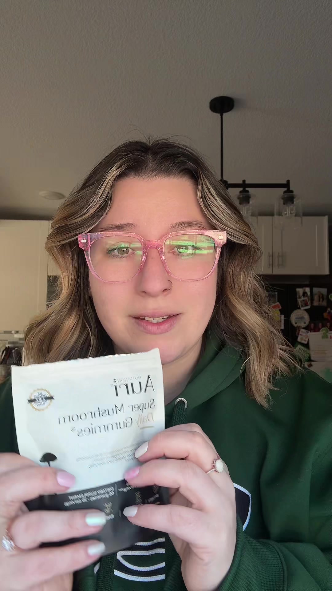 TikTok post by @emmily.elaine for Auri Nutrition. Caption reads: Mom hack - @Auri Nutrition simple as that! These....