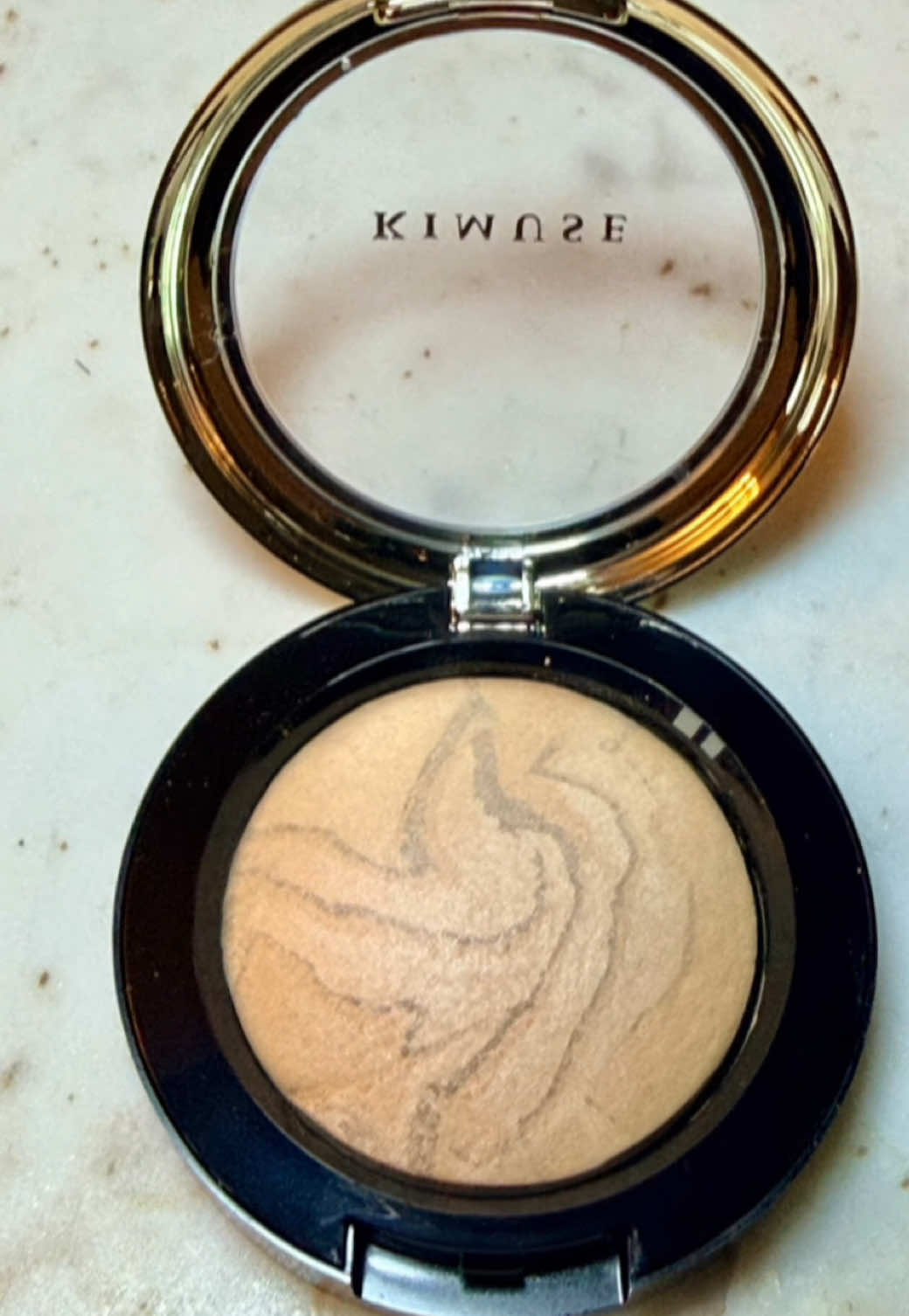 TikTok post by @classyandaffordablefinds for Kimuse. Caption reads: [...] a medium coverage airbrushed finish.....