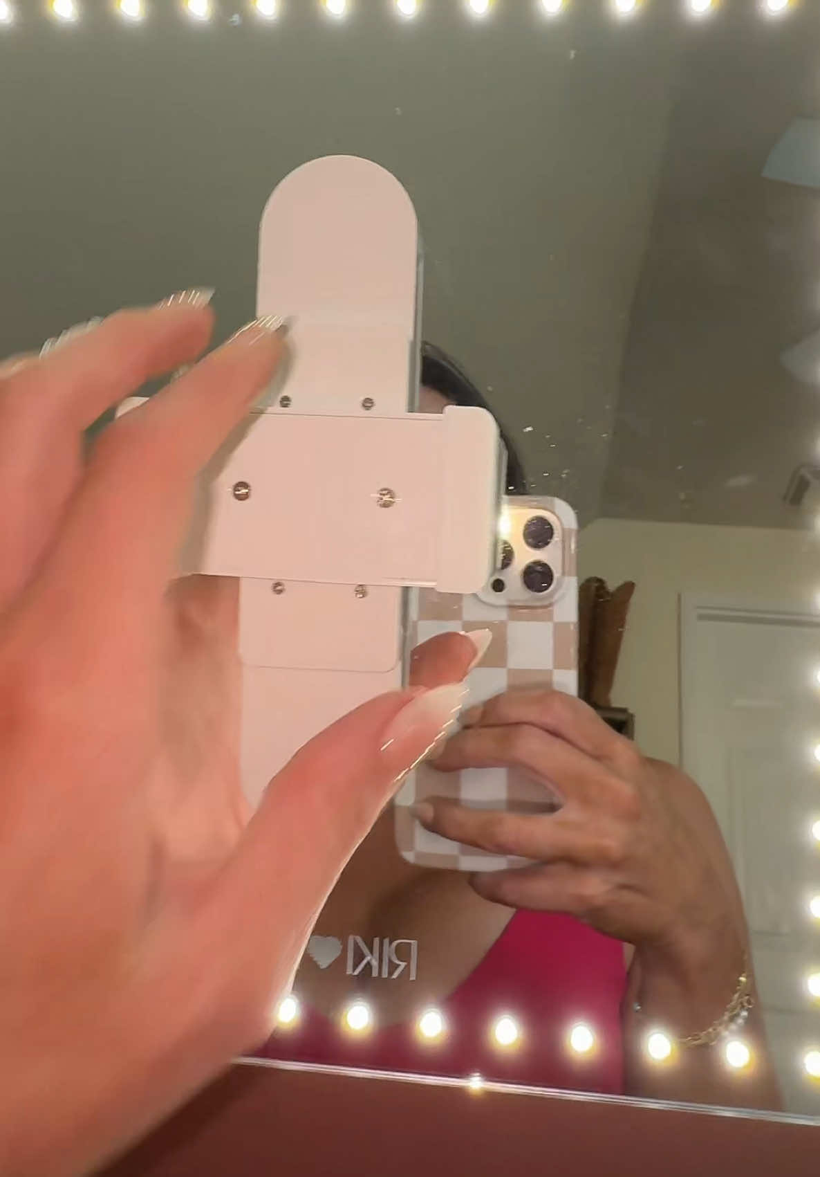 TikTok post by @life.as.annacasey for RIKI LOVES RIKI. Caption reads: Riki LED Makeup Mirror that actually provides the....