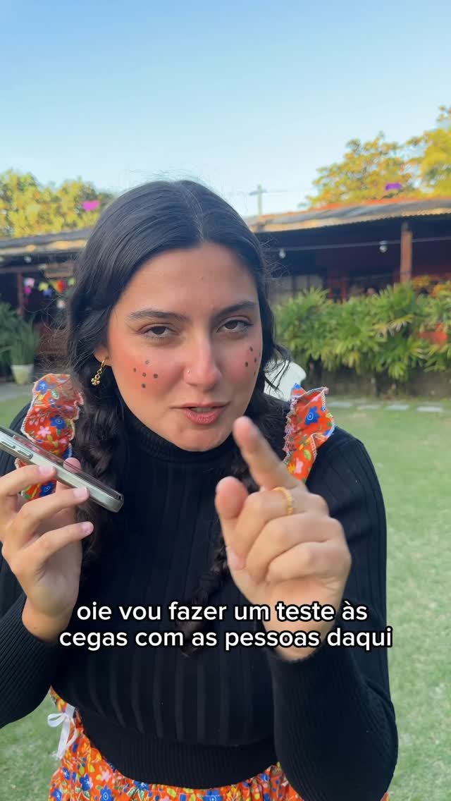 Instagram post by @juliaiorioo for Garnier. Caption reads: pra saber como é a textura, só testando! Já corre....