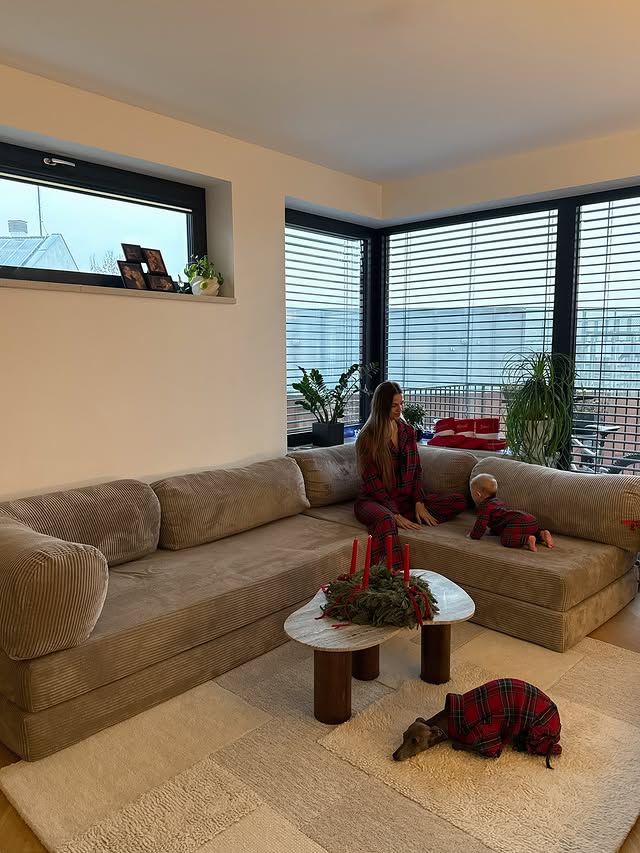 Instagram post by @justklaudy for OMHU. Caption reads: @omhu_cph sofa being a part of our family [...].