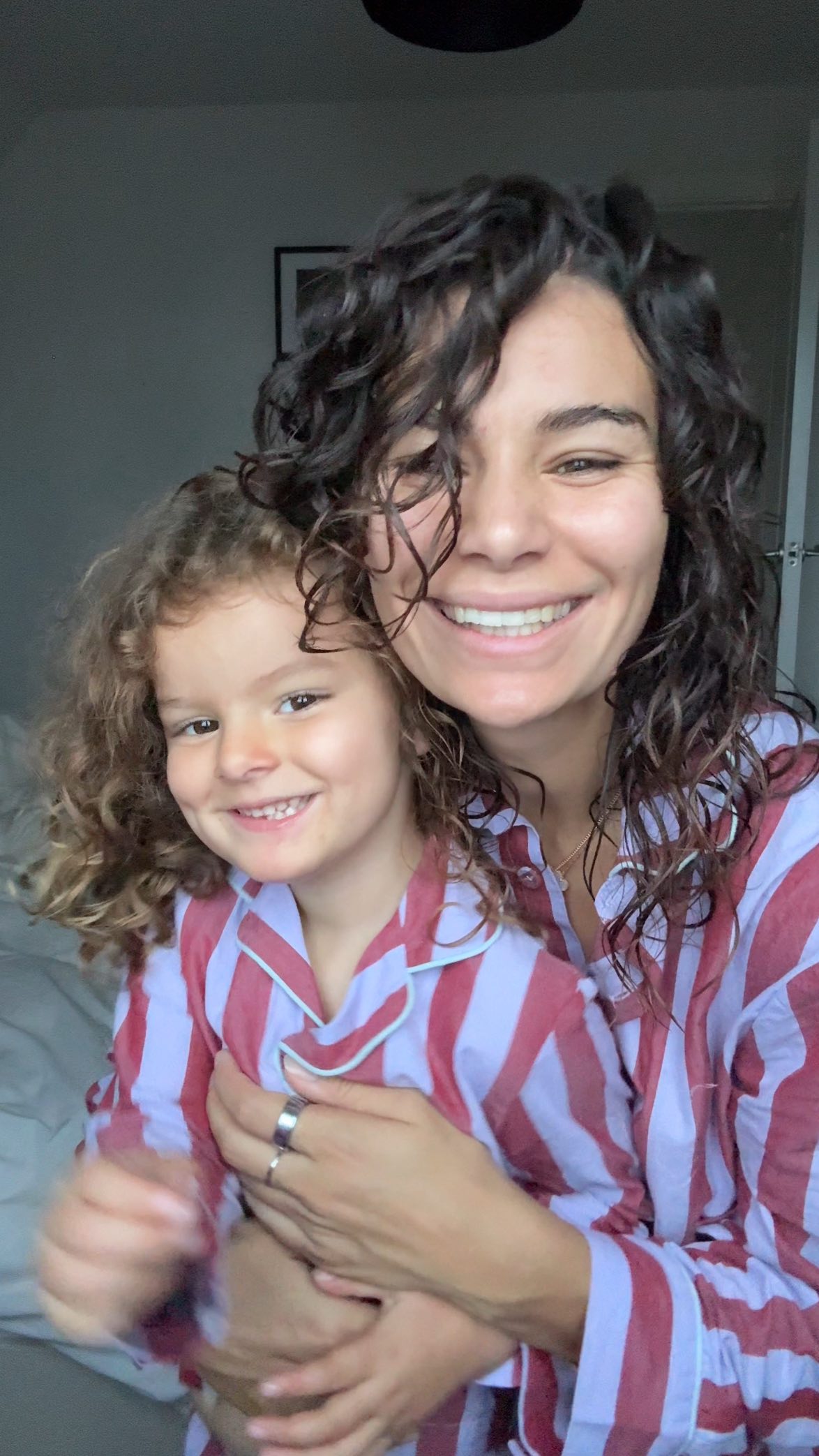 Instagram post by @sarah.tarleton for CURLSMITH. Caption reads: [...] my hair in its natural wavy style....