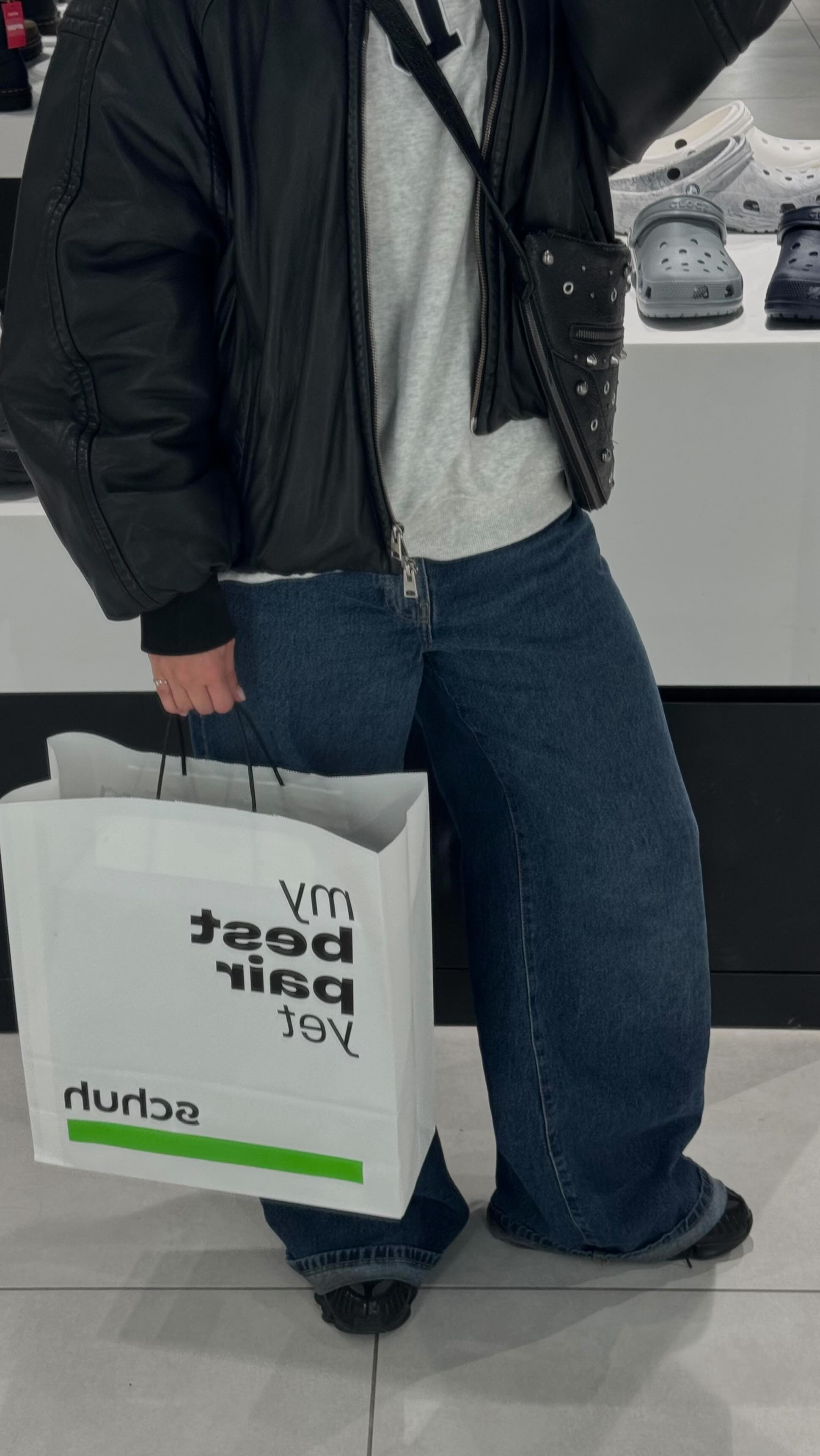 Instagram post by @hollyroche__ for Schuh. Caption reads: Christmas shopping made simple @schuh 💚 ad.