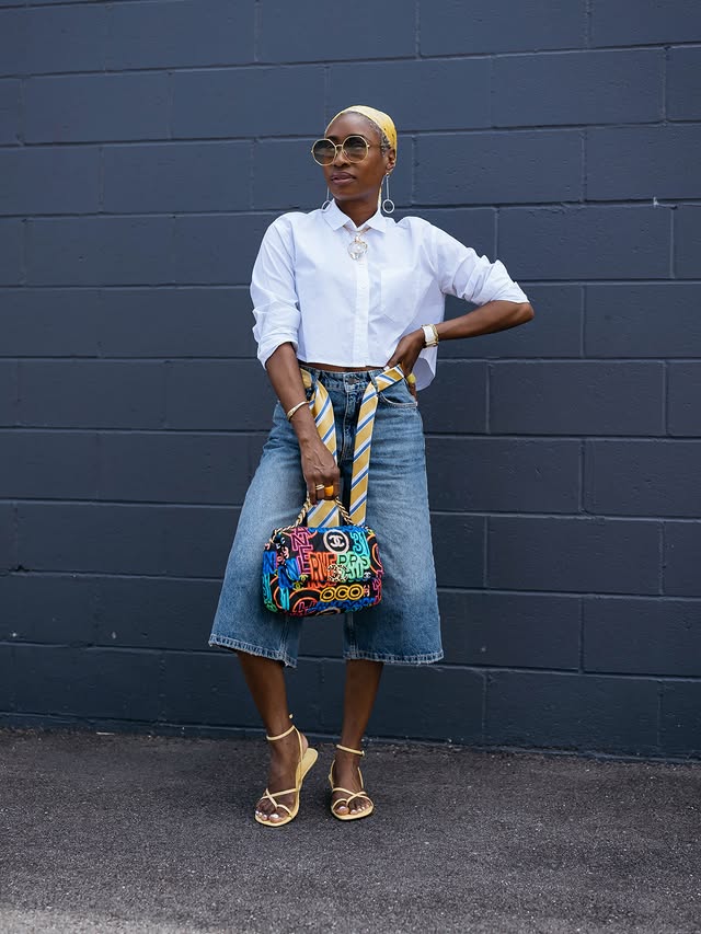 Instagram post by @simplygailg for Vivrelle. Caption reads: [...] outfit. 🙌🏾 Chanel graffiti bag via....