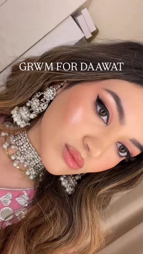 Instagram post by @rehnumavasi for ghd hair. Caption reads: ATTENTION: PINK IS MY FAVE COLOR....