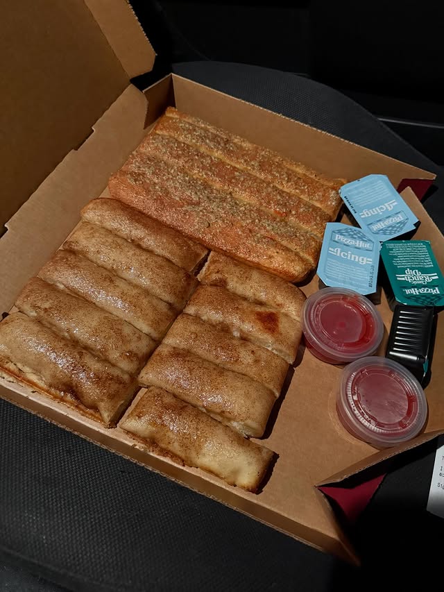 Instagram post by @lukefoods_ for Pizza Hut. Caption reads: The other night I picked up some breadsticks and....