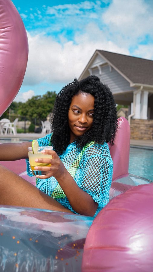 Instagram post by @naturallynella for The Mane Choice. Caption reads: I had to bring it back to a twist out since I....