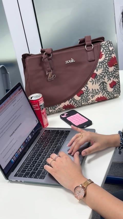 Instagram post by @akshitaachaudhary for Zouk. Caption reads: [...] just got an upgrade🙂‍↔️👜 Grab yours on....