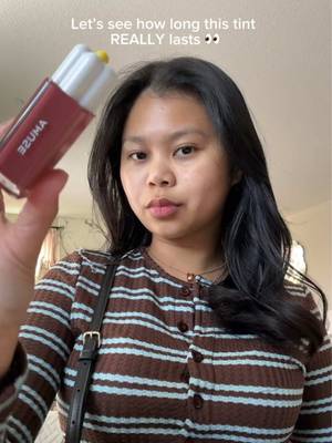 TikTok post by @yourgirlyma for AMUSE Seoul. Caption reads: [...] day with me + my AMUSE Dew Tint 💅 @AMUSE....