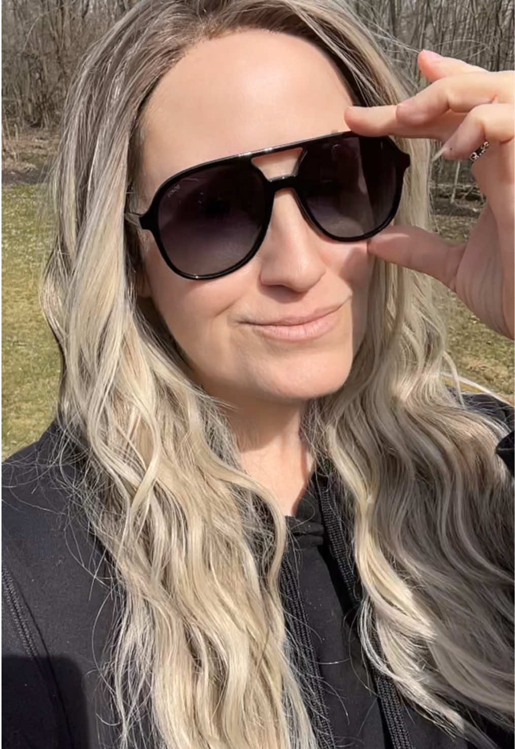 TikTok post by @virgo_lisairene for SOJOS. Caption reads: @sojosglasses #springglowup #sunglasses #sojos....