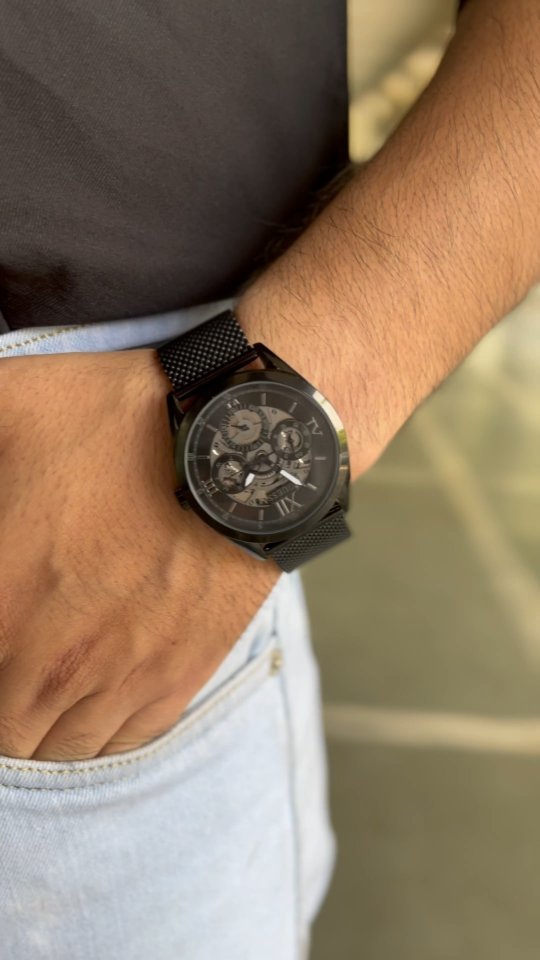Instagram post by @thedopeboyyyy for GUESS Watches. Caption reads: #Collab 
Always make a statement wherever you go,....