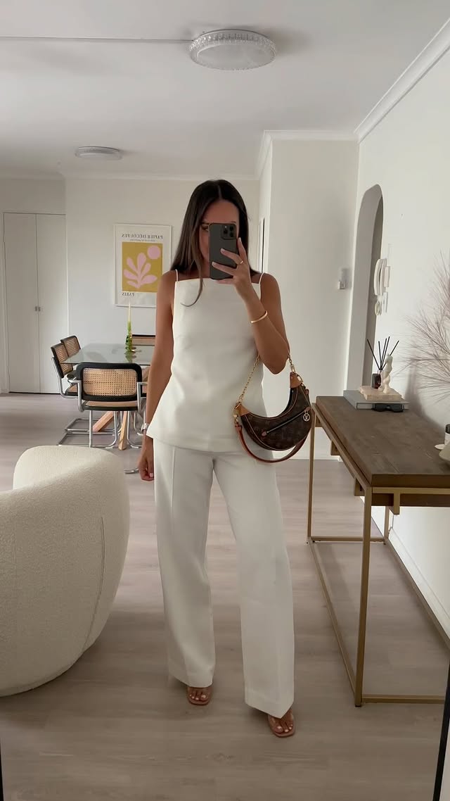 Instagram post by @sarawears for SHONA JOY. Caption reads: All white in @shonajoy 💭🤍 #shonajoy.